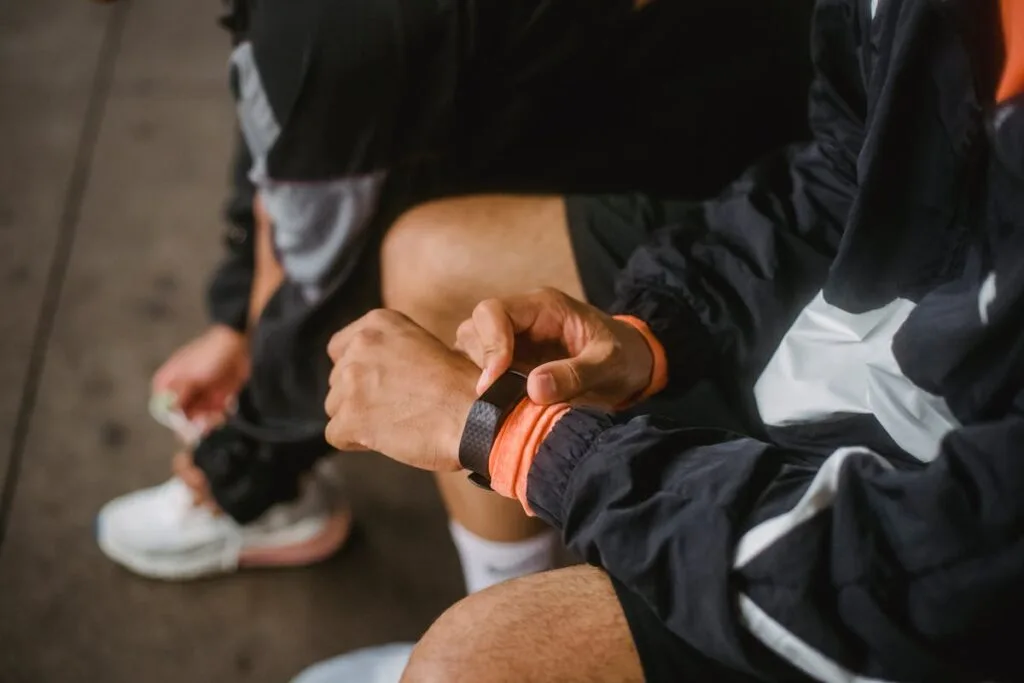 Runner checking a GPS sports watch on the wrist