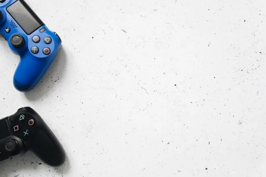 PlayStation controllers on a white background